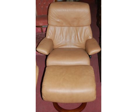 A Stressless light tan leather upholstered swivel armchair, with matching footstool (2)