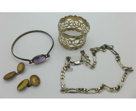 Silver including a bangle, cufflinks, a napkin ring and chain, 56.9g