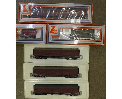 Six Lima OO gauge model rail carriages including a 3004 locomotive