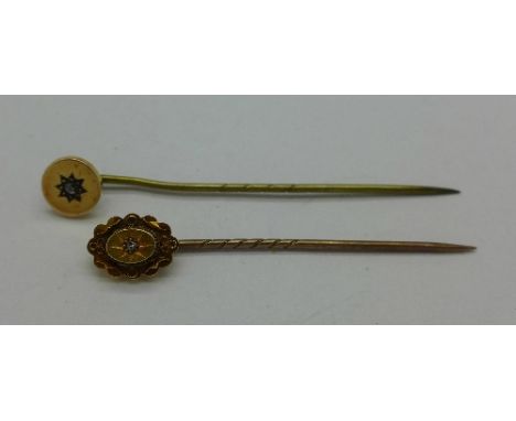 A 15ct gold and diamond stick pin and one other gold and diamond stick pin