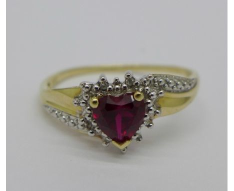 A 9ct gold, red stone and diamond ring, 2g, V