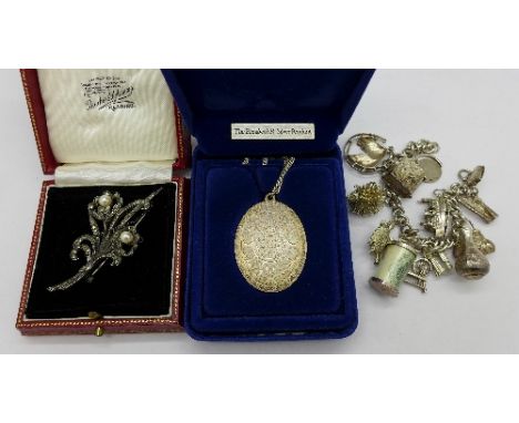 A silver Elizabeth R pendant, marcasite brooch and a white metal charm bracelet (tests as silver) 46.4g