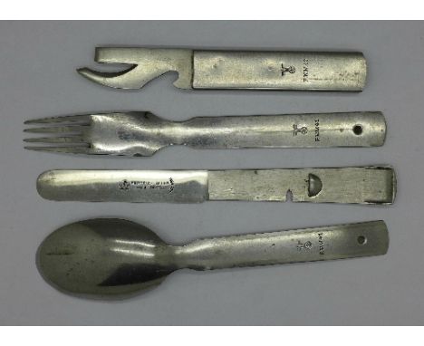 A World War Two field cutlery set of fork, knife, spoon and can opener marked F W W 41 with imperial German eagle and swastik