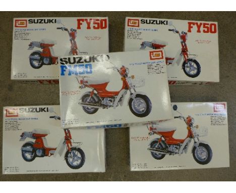 Three Imai Suzuki FY50 and two Suzuki FM50 1/12th scale motor bikes, boxed