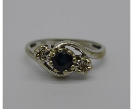 A 9ct white gold, diamond and sapphire ring, 1.8g, L