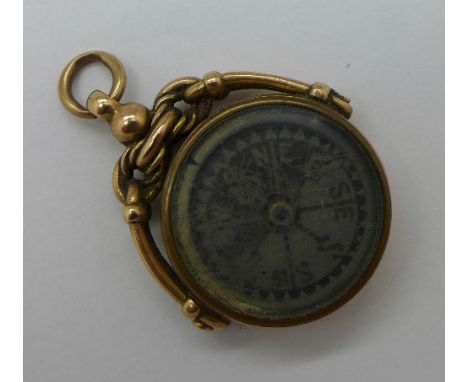 A 9ct gold compass fob, lacking stone