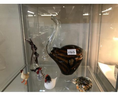 An art glass elephant, rabbit , 3 chicks and a birds head.Elephant base is matt with blow hole, very small chip to edge at bo