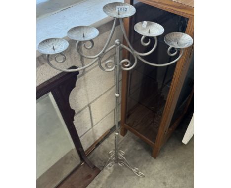 A wrought iron pricket multi candlestick