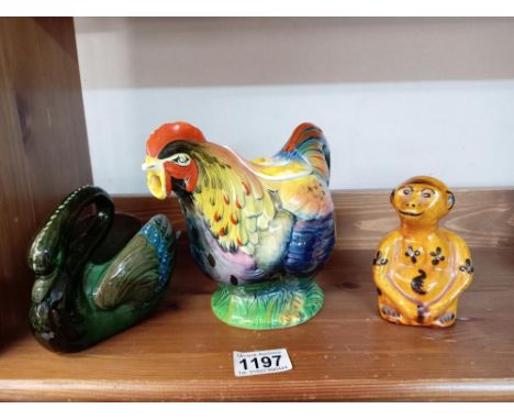 A Rooster RDNC 810176 teapot Circa 1930's, A swan planter & Pottery monkeyAll have no damage.