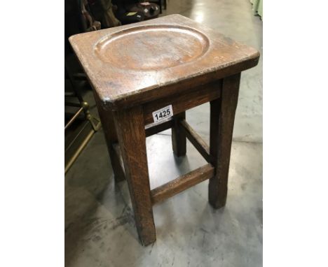 A vintage oak stool