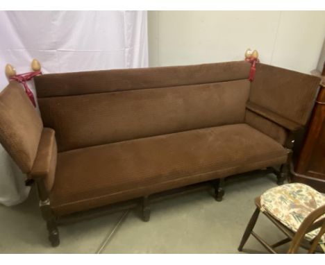 A vintage drop end settee