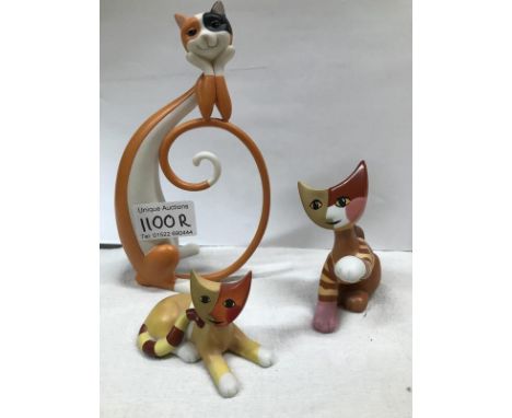 Two Goebel cats and 1 other