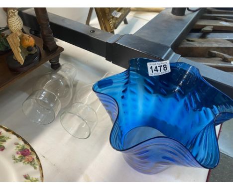 A blue glass oil lamp shade and 2 chimneysNo cracks or chips. Small nibbles to the top. Bottom rim is 4.125'' or 10.5cm . Sha