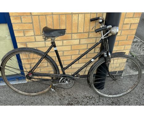 A vintage Raleigh ladies bicycle