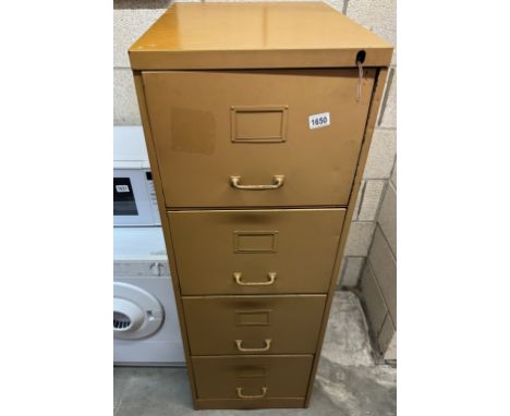 A vintage metal 4 drawer filing cabinet