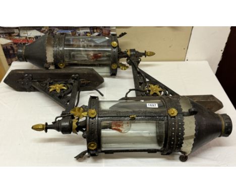 A pair of vintage metal wall light sconces