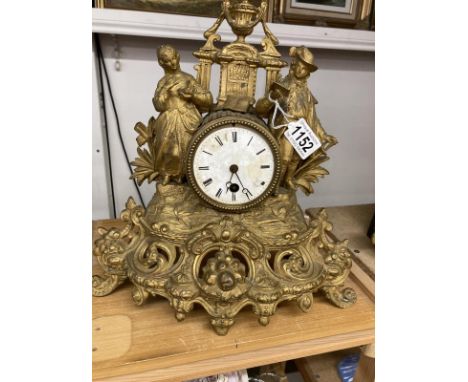 A guilded spelter mantel clock