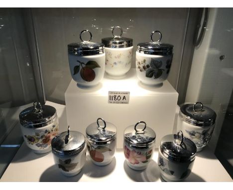 Nine Royal Worcester egg coddlers