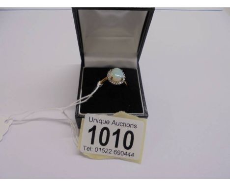 A 9ct gold ring set opal, size P, 2.56 grams.