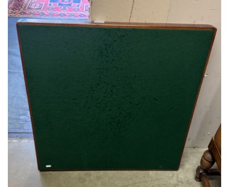 A vintage folding card table