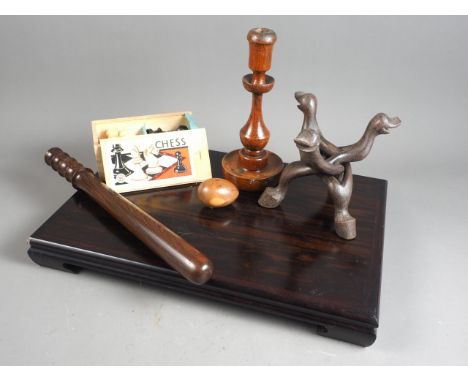 A Chinese hardwood stand, 19" x 12 1/2" x 2" high , a box and ebony chess set, a truncheon, a yew egg and an oak candlestick