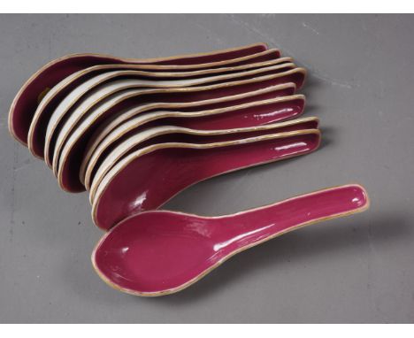 Five Chinese porcelain purple glazed rice spoons with five matching smaller spoons, all with seal marks to bases (some crazed