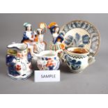 A Staffordshire flatback figure, "Musicians", 8 1/2" high, two other similar Staffordshire