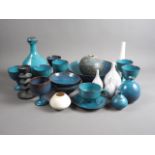 Annette Fuchs: a collection of turquoise glazed studio pottery bowls and goblets, three studio