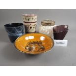 An early 20th century pearlescent glass rose bowl, a Gray's Pottery hand-painted lustre vase and