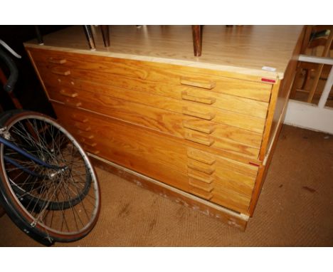A modern light oak plan chest, fitted ten drawers, on block base, 53" wide x 39" deep x 33" high 