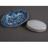 A Makkum delftware oval dish, 5" max dia (rim chip restored) and a Limoges oval box and cover