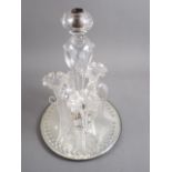 An early 20th century lampwork table centre/epergne, on mirror base, 16" high