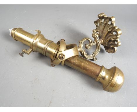 A ship's 19th century brass gimballed candlestick, on acanthus scroll bracket, 10" high 