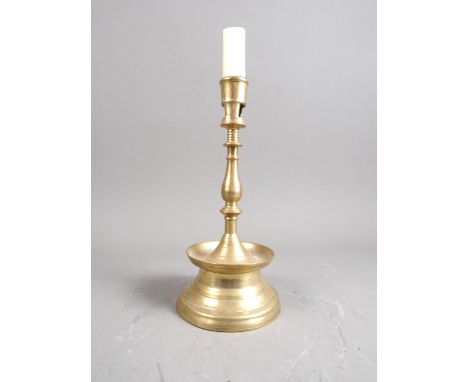 An early 17th century brass capstan type candlestick, 8 1/4" high Condtion: No visible problems
