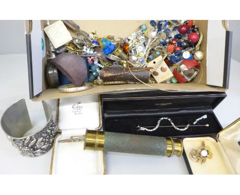 A collection of vintage costume jewellery, a three draw antique brass pocket telescope, jewellery boxes, earrings and costume