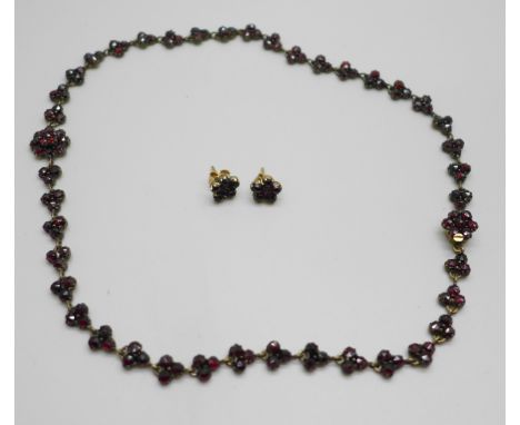 A vintage garnet necklace and earrings 