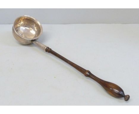 A Georgian silver toddy ladle with worn London hallmark and later handle 