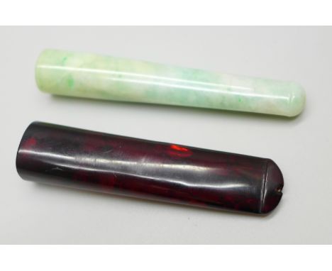 Two cigarette/pipe holders; one jadeite and one amber (a/f) 