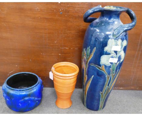 A large Art Nouveau pottery vase, rim restored, a Bretby planter, restored and an orange Branham pottery vase **PLEASE NOTE T