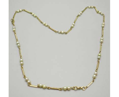 A vintage 9ct gold and pearl necklace, 20g, approximately 68cm 