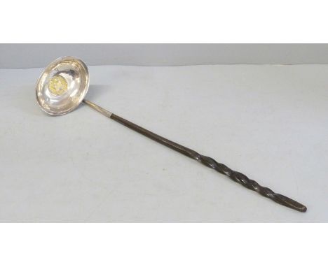 A Georgian toddy ladle inset with a George III 1787 silver coin 