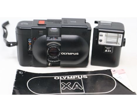 Olympus XA 35mm compact camera with flash. UK P&amp;P Group 1 (£16+VAT for the first lot and £2+VAT for subsequent lots) 