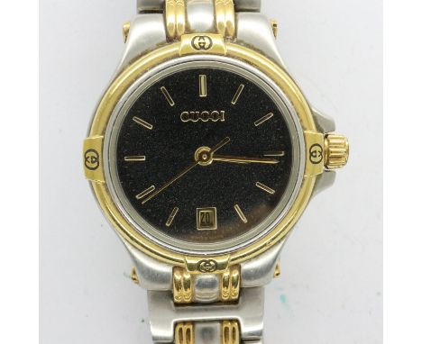 GUCCI: ladies wristwatch with date aperture on a stainless steel bracelet, not working at lotting. UK P&amp;P Group 1 (£16+VA