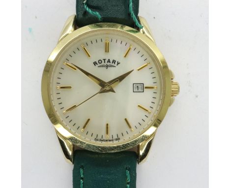 ROTARY: ladies wristwatch with mother of pearl dial and date aperture on a green leather strap, not working at lotting. UK P&