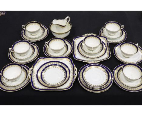 George Jones Crescent China tea service of thirty six pieces, signs of use but no cracks or chips. Not available for in-house