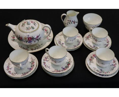 Wedgwood tea service of twenty one pieces in the Devon Sprays pattern, model W4076, mild signs of use but no cracks or chips.