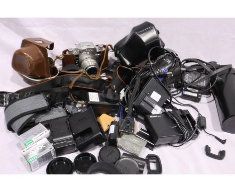 Mixed camera accessories including 2-35mm films, chargers, batteries, hoods, straps etc and a EXA camera. UK P&amp;P Group 2 