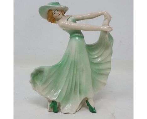 Art Deco ceramic figurine in the manner of Goldscheider, numbered 35738 to base, no cracks or chips, H: 14 cm.  UK P&amp;P Gr