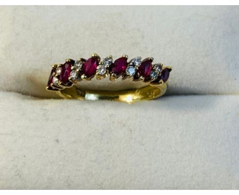 Ruby and Diamond half eternity ring, set alternating navette claw set rubies and pairs of single cut diamonds, all set in 15c