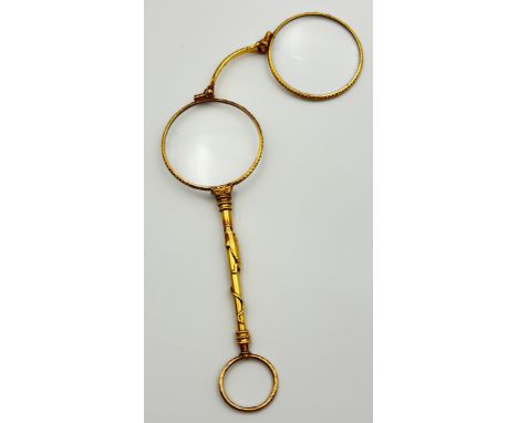 French 15k Gold Folding Lorgnettes with glass lenses, lizard design to the shaft with ruby eyes Weight - 30.20g
